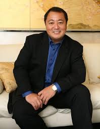 Dr. Wynn Okuda DMD cosmetic dentist Honolulu Hawaii AACD Accredited Fellow